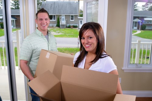 Moving team handling boxes during a Southwark home relocation