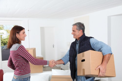 Moving boxes and furniture in a Southwark flat