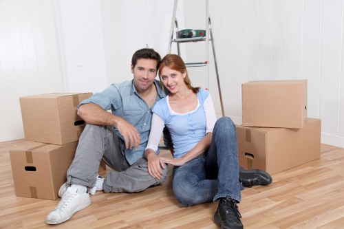 Professional movers loading household items for a Southwark relocation