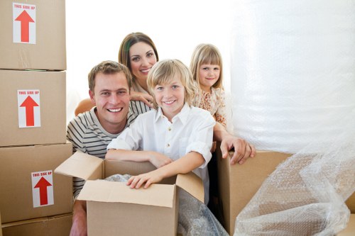 Furniture being carried from a Southwark flat during a residential move