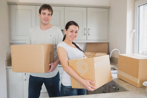 Customer planning a truck hire move with boxes and furniture
